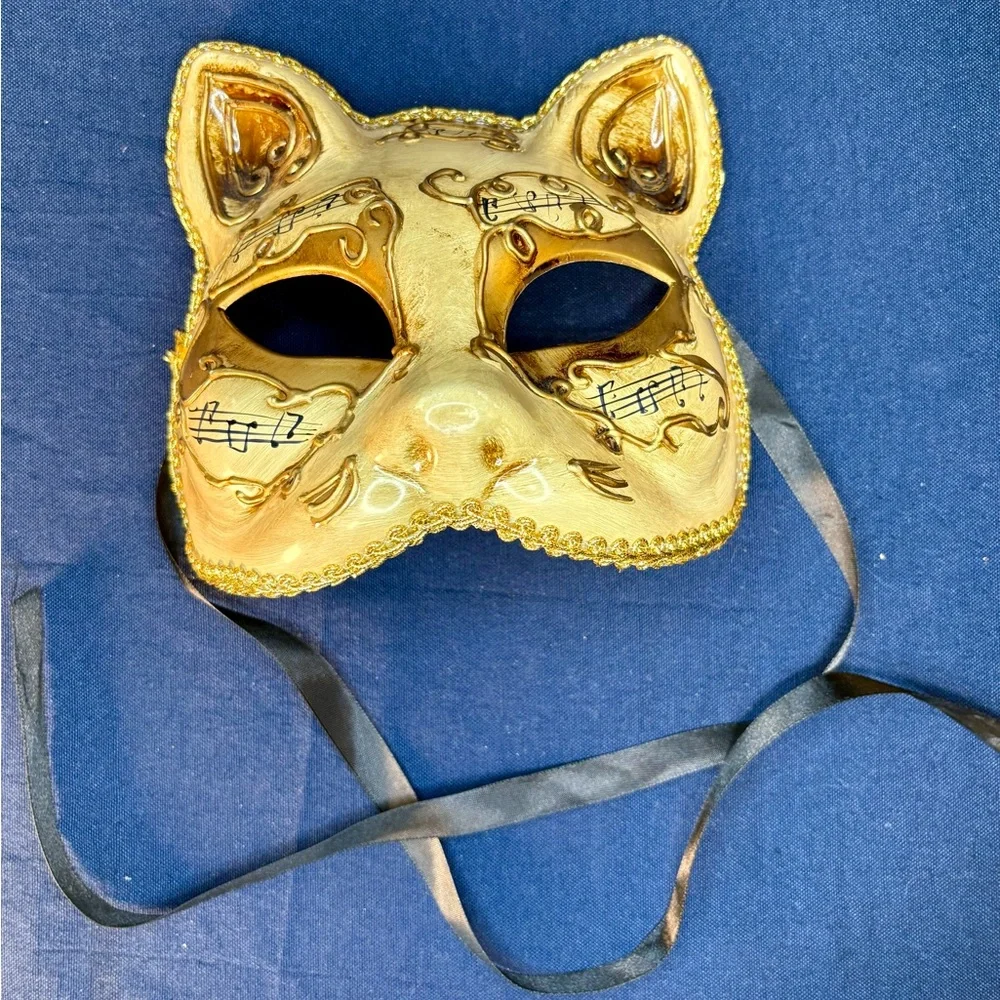 Elegant Gold Cat Mask with Musical Accents
